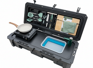 VOZ portable camp kitchen top angled view showing cooking station, sink, rechargeable faucet and organized utensils