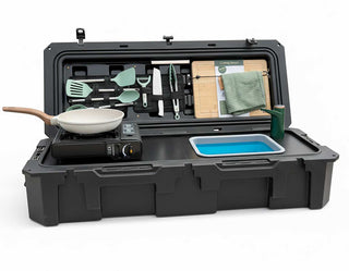 VOZ portable camp kitchen front view with sink, cooking station, cutting board and organized utensils