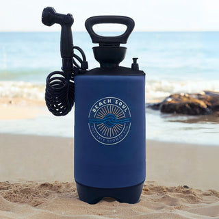Beach Soul Ocean Rise PRO 2.6-gallon pressurized portable shower on the beach