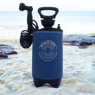 2.6-gallon pressurized portable shower for camping and beach adventures